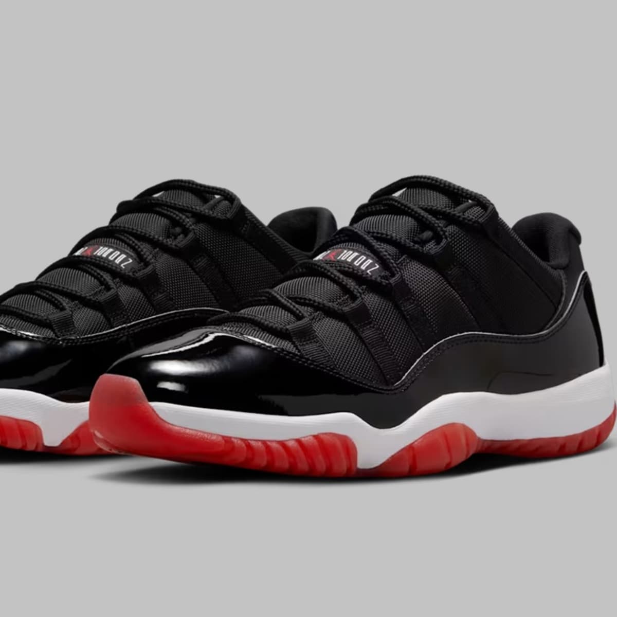Air Jordan 11 Retro Low “Bred” – Black/White/Varsity Red