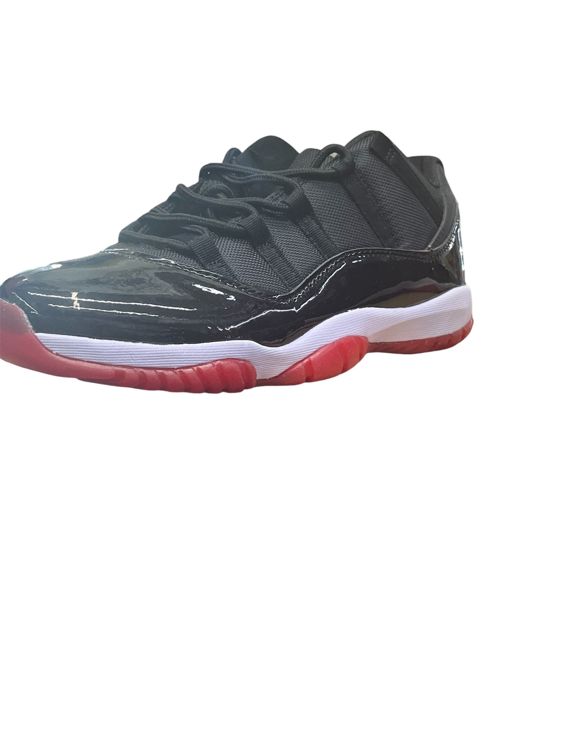 Air Jordan 11 Retro Low “Bred” – Black/White/Varsity Red